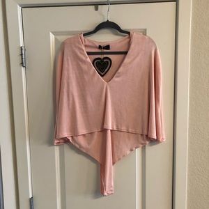 Blush bodysuit with shelf overlay